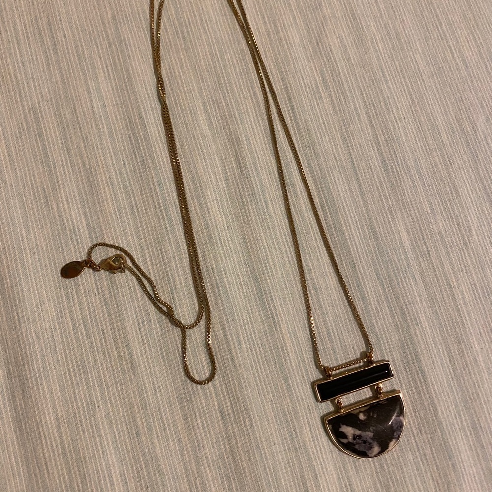Faux marble necklace with gold colored chain
